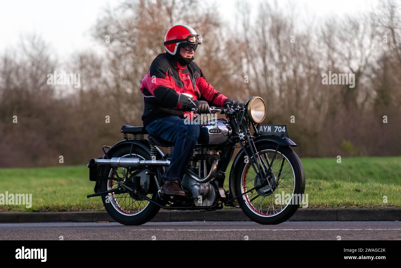 Stony Stratford,UK Jan 1st 2024. 1934 Ariel Red Hunter vintage motorcycle arriving at Stony Stratford for the annual New Years Day vintage and classic Stock Photo