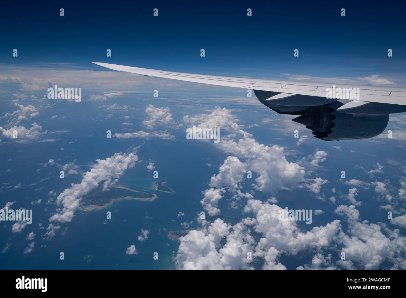 13.07.2023, Singapore, Republic of Singapore, Asia - View from a Lufthansa Boeing 747-8 Jumbo Jet passenger jet of the wing and engine during a flight. Stock Photo