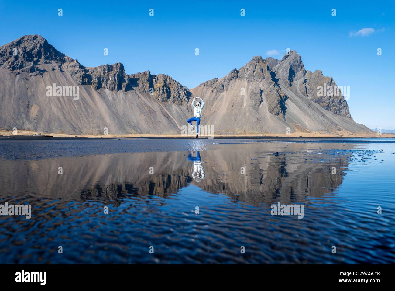 Woman posing on Stokksnes beach, Iceland Stock Photo