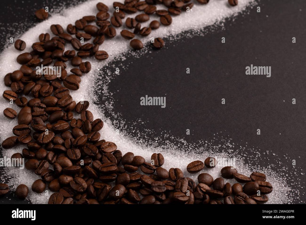 In this close-up photo, the rich texture of roasted coffee beans takes center stage background. Each aromatic seed, enhanced by the addition of sugar, Stock Photo