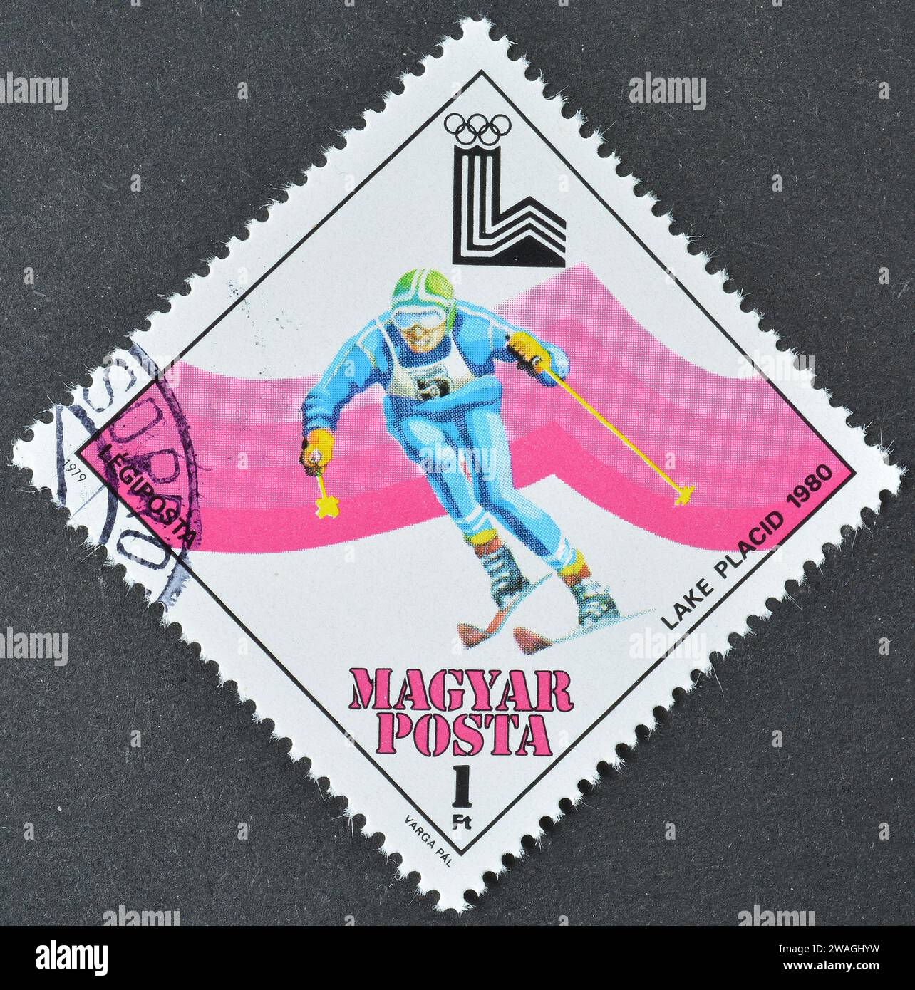 Cancelled postage stamp printed by Hungary, that shows Downhill Skiing