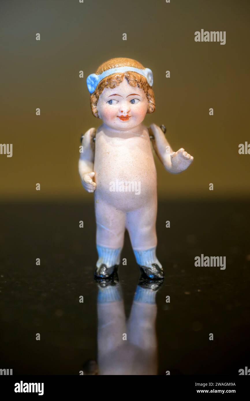 Vintage, bisque, flapper, miniature, kewpie doll, with articulated arms Stock Photo