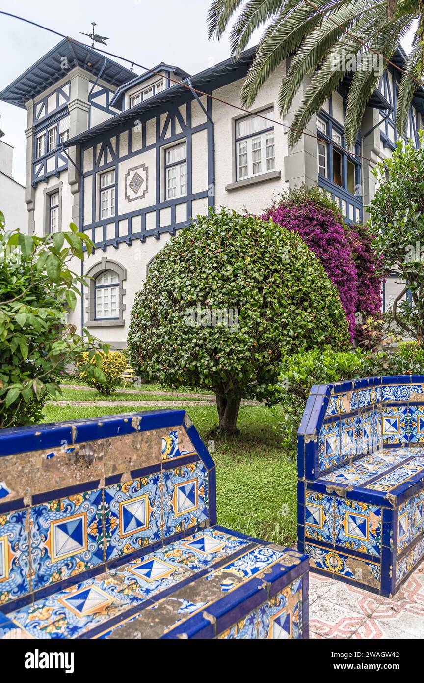NAVIA, SPAIN - AUGUST 22, 2022: Colorful mansion typical of Asturias, northern Spain, in the village of Navia Stock Photo