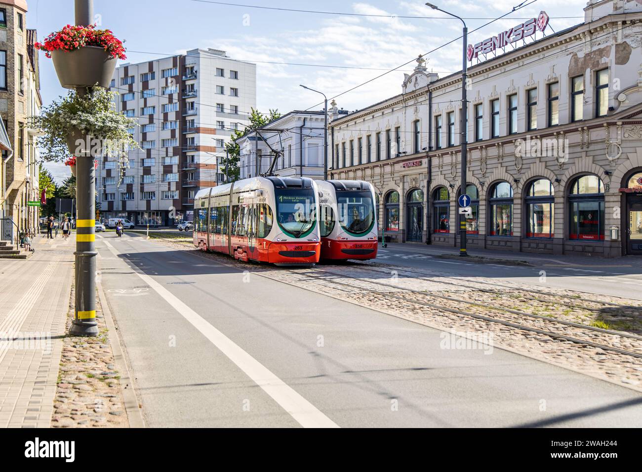 Liepaja , Latvia- July 7, 2023: New trams next to each other number one route is running in Liepaja town center Stock Photo