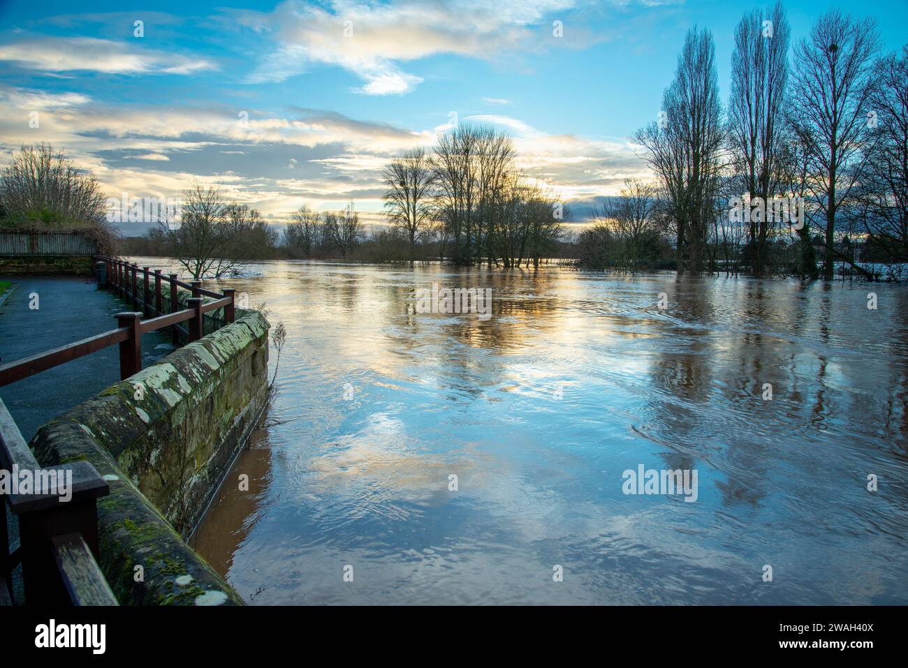 Significant flooding from rain water pouring into the Severn river,covering fields and pathways, from sourounding hills and countryside after prolonge Stock Photo