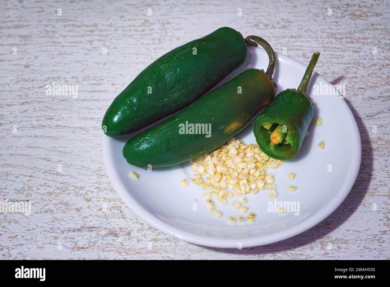 Green jalapenos sliced isolated hi-res stock photography and images - Alamy