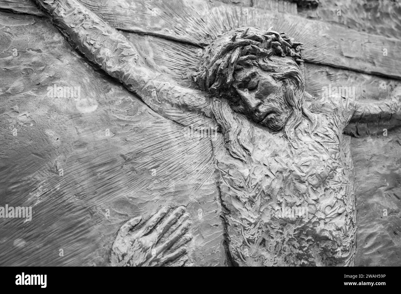 The Crucifixion of Jesus – Fifth Sorrowful Mystery of the Rosary. A relief sculpture on Mount Podbrdo (the Hill of Apparitions) in Medjugorje. Stock Photo