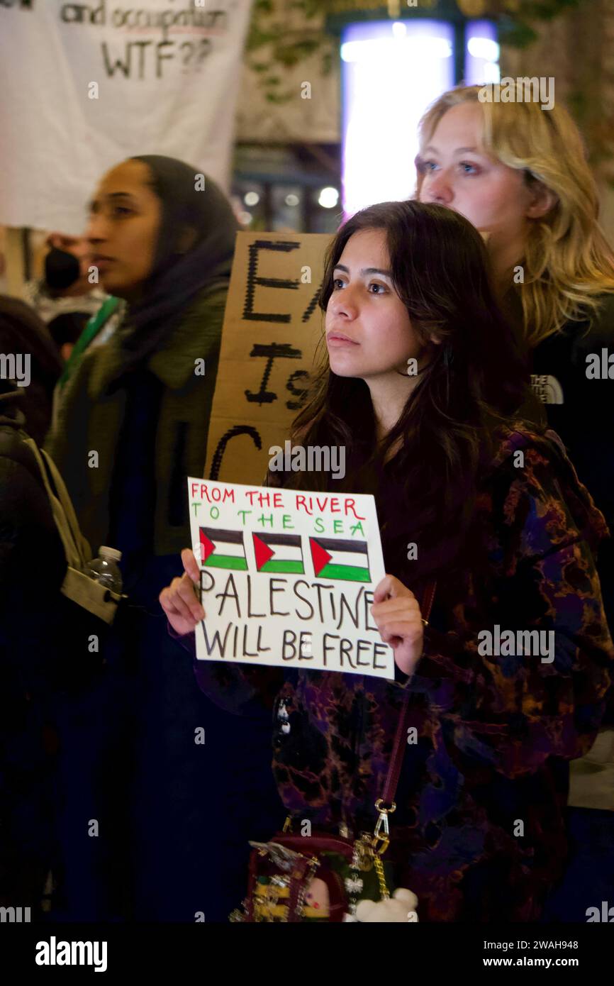 Shut Down Google: No Tech For Genocide. Protester holds sign 'From the River to the Sea, Palestine will be free'. San Francisco, CA, USA Stock Photo