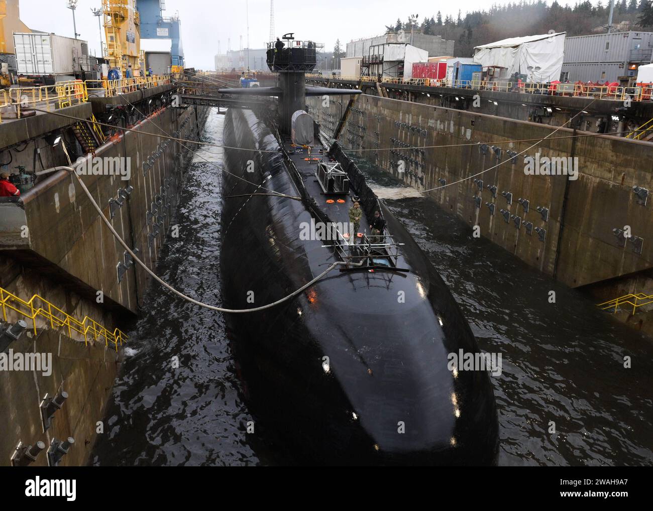 Photo of Ohioclass ballistic missile submarine USS Nevada (SSBN 733) docked in Naval Base