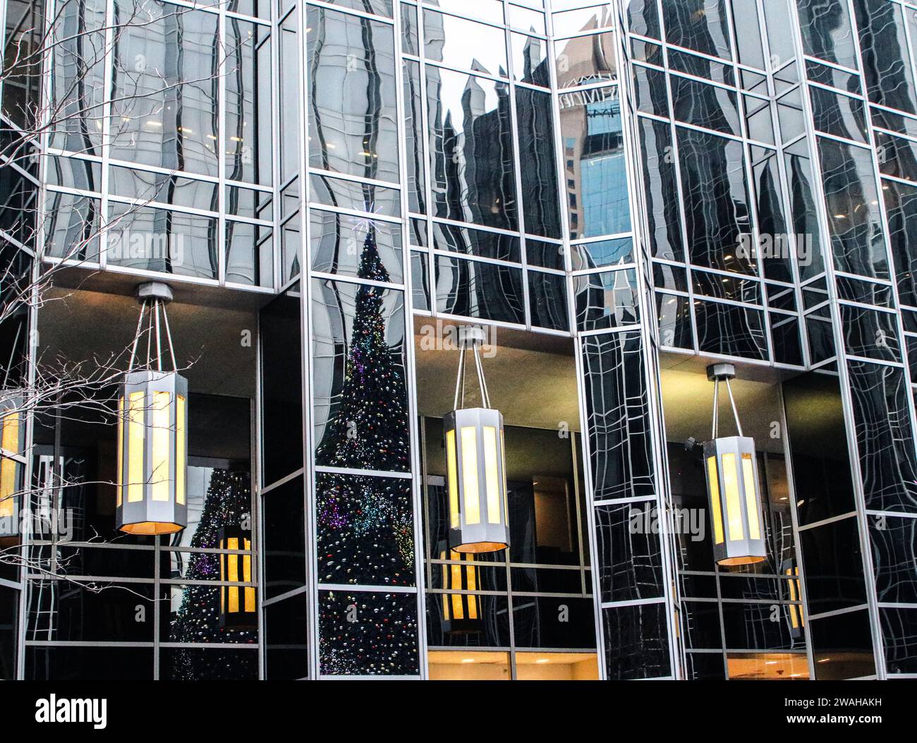 Reflections and geometric lines along the building windows of the PPG Industries Building in Pittsburgh, PA Stock Photo