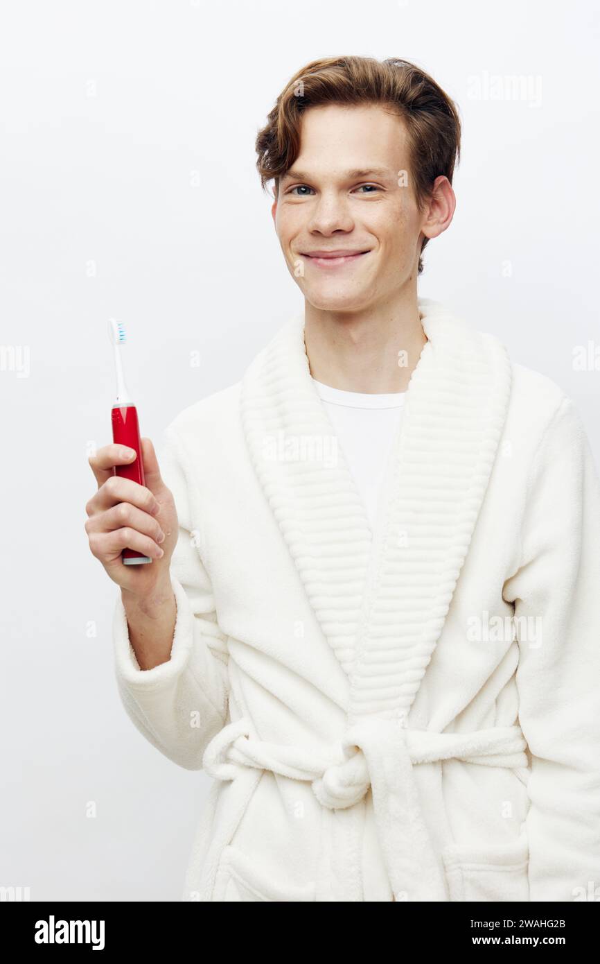 Fresh Morning Routine: Young Handsome Man Taking Care of His Hygiene in ...