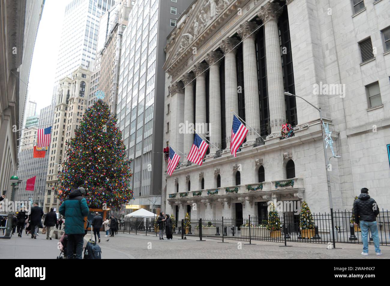 New York, United States. 04th Jan, 2025. Pedestrians take photos and