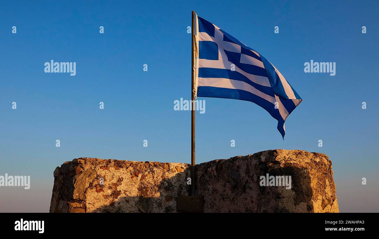 Evening light, Corner tower, Greek national flag, Frangokastello, Venetian fortress, Zwingburg, Sfakia, West Crete, South coast, Island of Crete Stock Photo