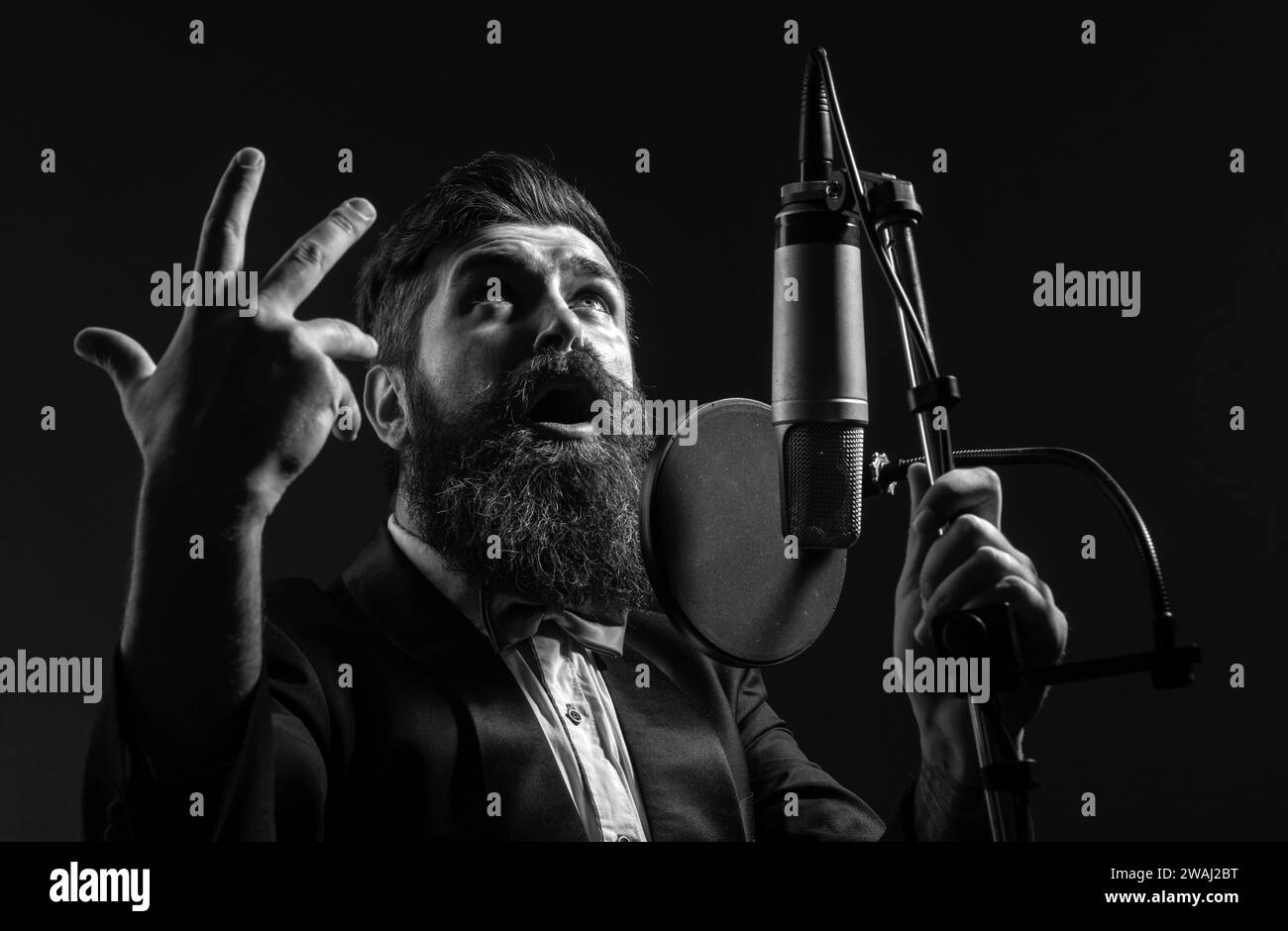 Man singing in recording studio Black and White Stock Photos & Images ...