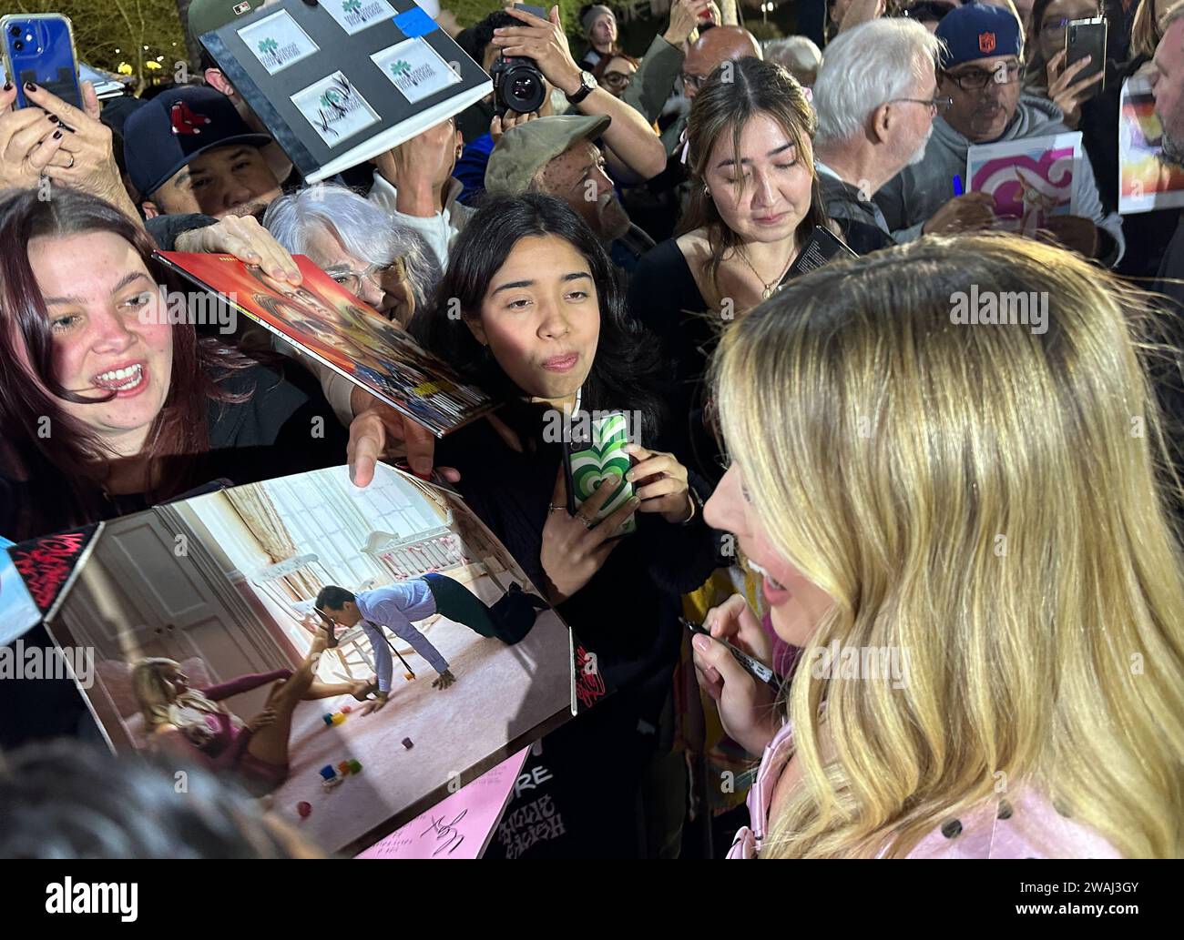Palm Springs, California, U.S.A. 4th Jan, 2024. Margot Robbie signs