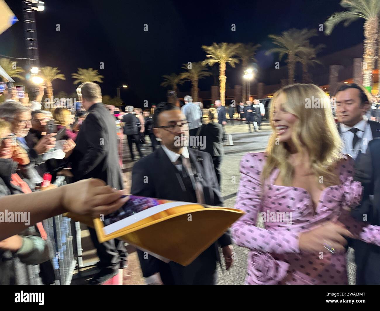 Palm Springs, California, U.S.A. 4th Jan, 2024. Margot Robbie signs