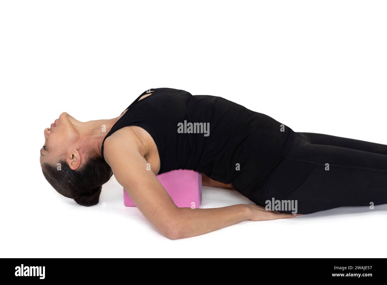 Trauma releasing exercises, senior citizen woman in her sixties ...