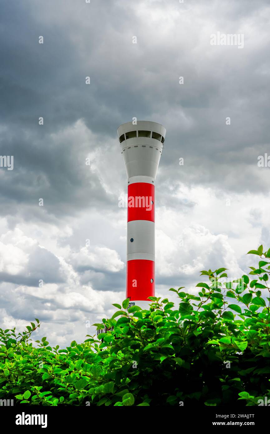 Red and white Blankenese lighthouse near Hamburg. Historic lighthouse on the Elbe at the Muehlenberg marina. Stock Photo