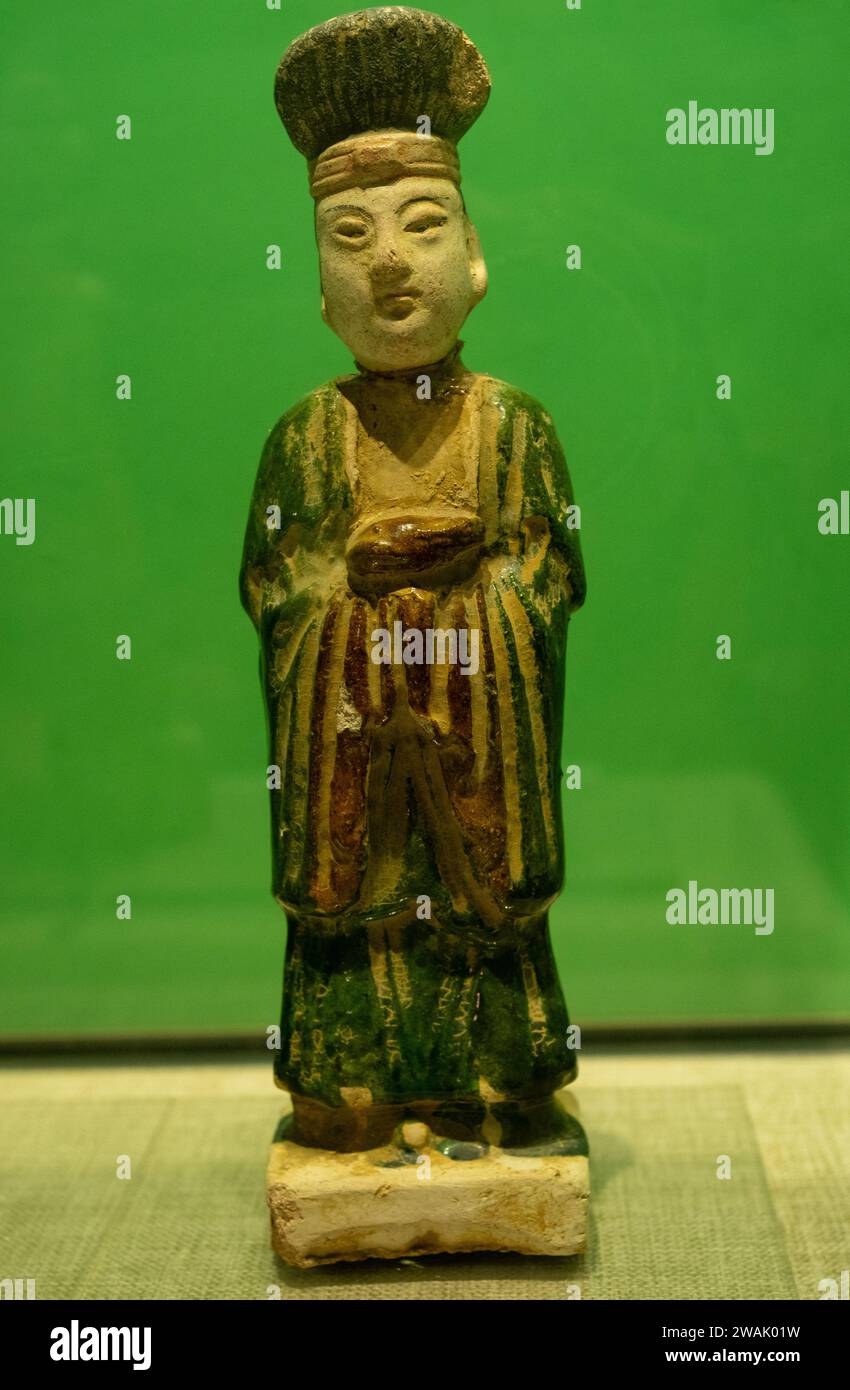 Tri-coloured Glazed Pottery of Khitan man in Liao Dynasty (907–1125). Tongzhou Museum in Beijing, China. Stock Photo