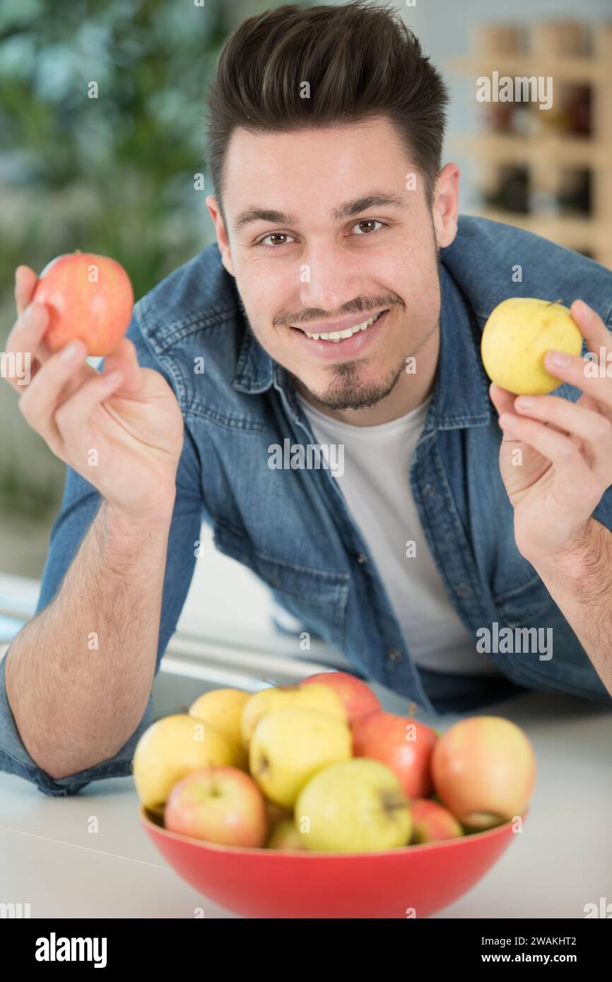 happy man with apples Stock Photo
