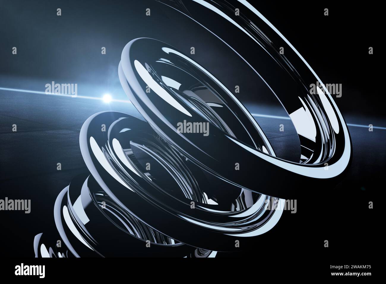 Metal spring close-up against the background of an asphalt area, night ...