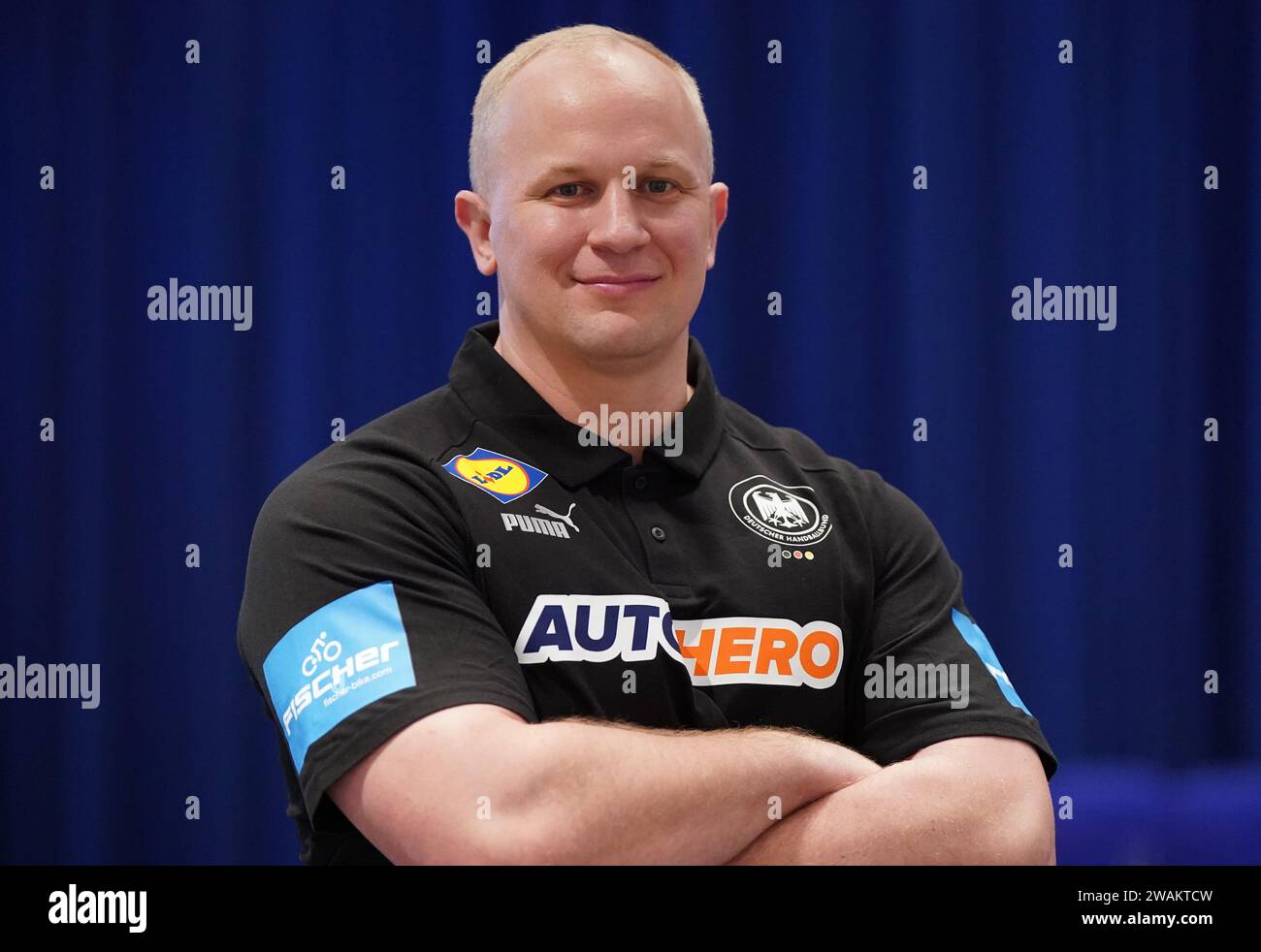 05 January 2024, Schleswig-Holstein, Brunsbüttel: Handball: European Championship, men, German Handball Federation (DHB) media event, team photo and individual photos, at the Elbeforum Brunsbüttel. Athletics coach Simon Overkamp. Photo: Marcus Brandt/dpa Stock Photo