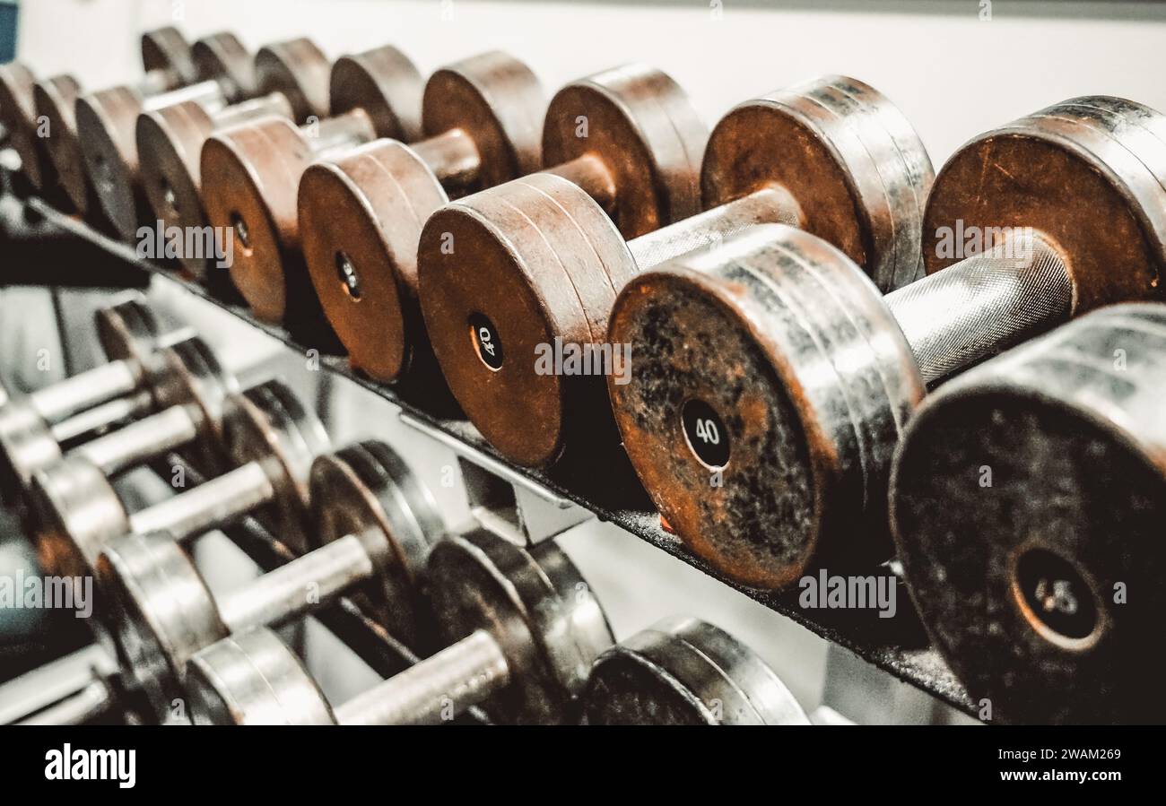 Rack of iron dumbbells at the gym Stock Photo Alamy
