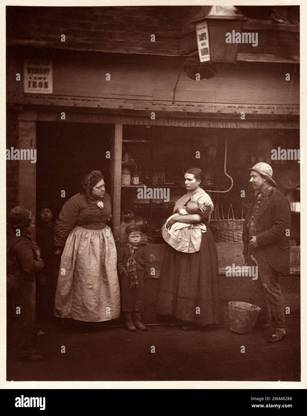 Street Life in London Sufferers from the Floods. 1877. John Thomson.  Woodburytype. Stock Photo