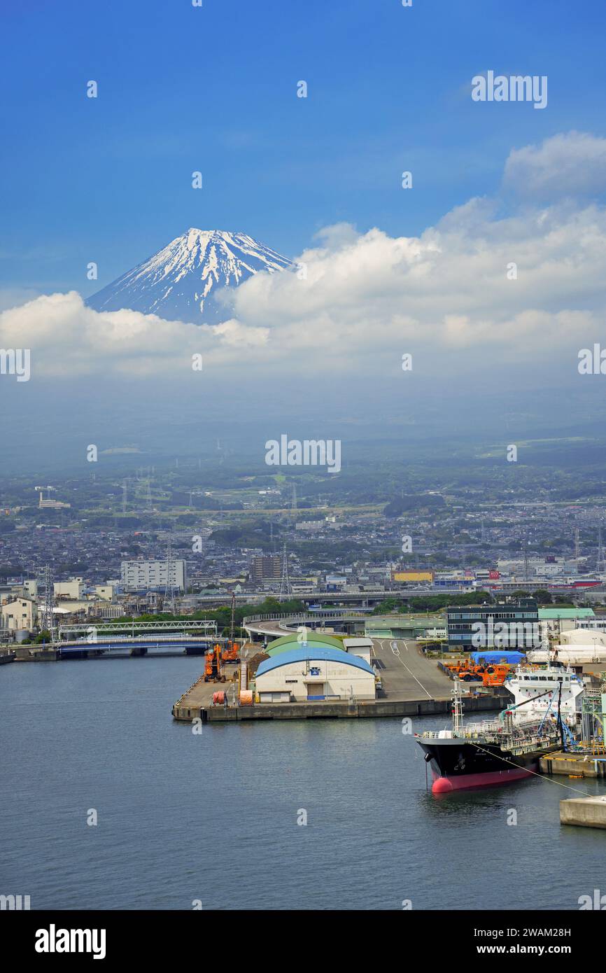 View over the city Fuji and Tagonoura Port with Mount Fuji in the background in spring, Shizuoka Prefecture, Japan Stock Photo