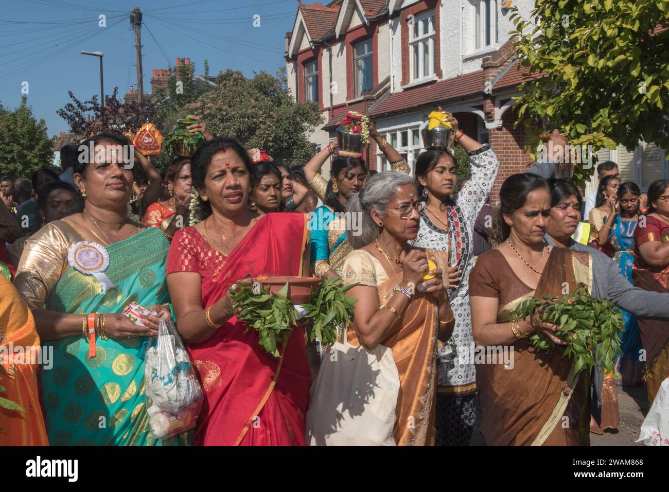 Immigration into Britain, British multicultural society, group women Hindu community attend and take part in a traditional Hindu annual festival in suburban London England 2022 2000s HOMER SYKES Stock Photo