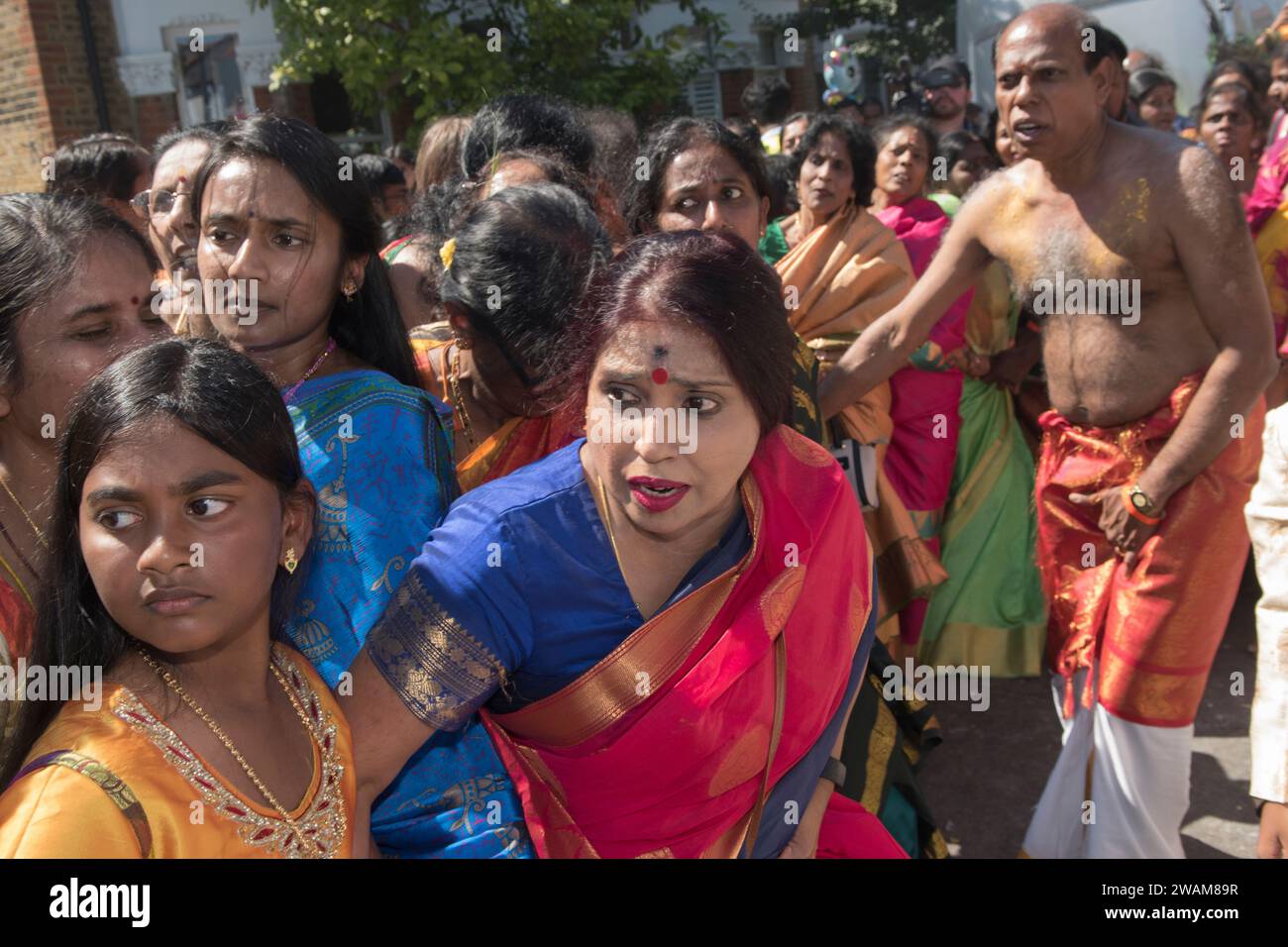 Multi Cultural Britain UK Immigration immigrant group from the Hindu Tamil community attend and take part in a traditional Hindu annual festival in suburban Wimbledon London England 2022 2000s HOMER SYKES Stock Photo