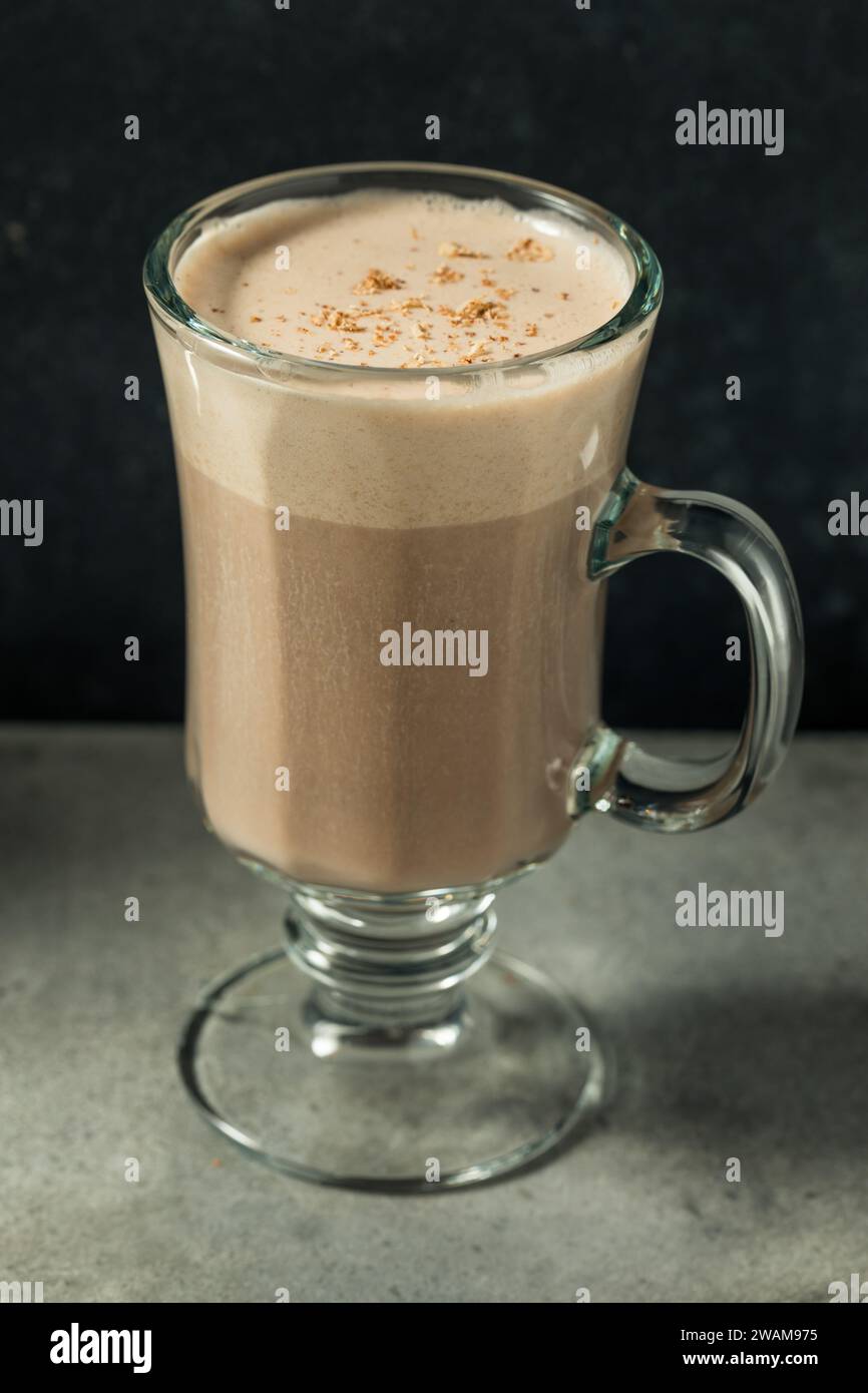 Homemade Festive Chocolate Eggnog with Nutmeg in a Glass Stock Photo ...