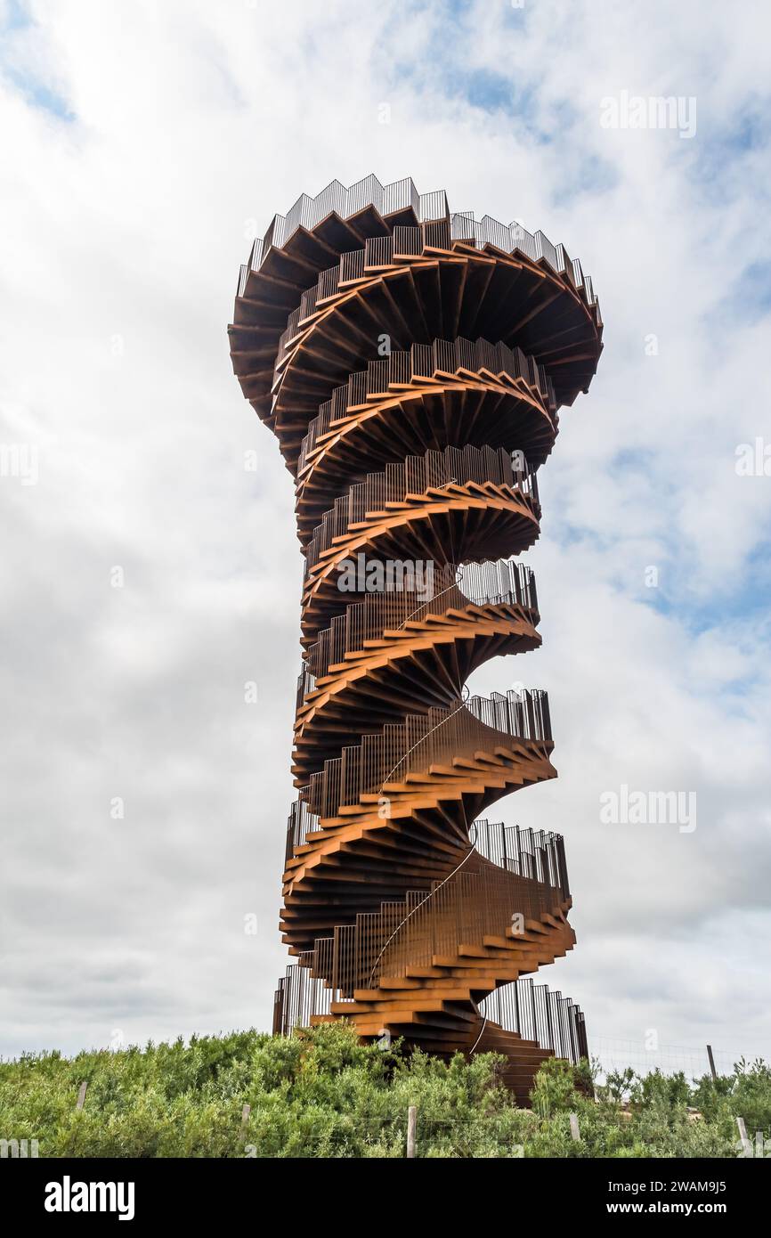 Skaerbaek, Denmark - June 4, 2023: Marsk or Marsh Tower is a double helix-shaped corten steel observation tower located in the Wadden Sea National Par Stock Photo