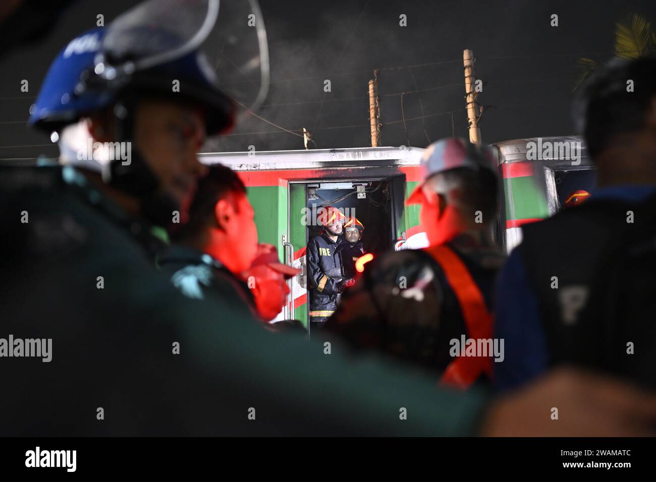 Dhaka Dhaka Bangladesh 5th Jan 2024 Firefighters And BGB Work At   Dhaka Dhaka Bangladesh 5th Jan 2024 Firefighters And Bgb Work At The Scene Of A Fire Set To A Passenger Train Ahead Of The General Election In Dhaka Bangladesh January 5 2024 Five People Were Killed In Bangladesh After A Passenger Train Which Was Arriving In The Capital Dhaka From The Western City Of Jessore Caught Fire Credit Image Fatima Tuj Johorazuma Press Wire Editorial Usage Only! Not For Commercial Usage! Credit Zuma Press Incalamy Live News 2WAMATC 