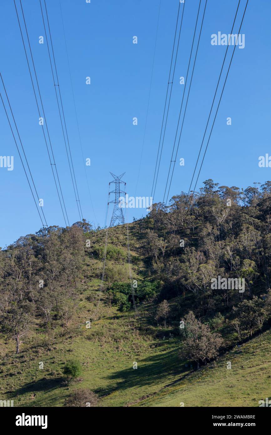 Photograph of a large telecommunications tower located on a green and grassy hill in the Blue Mountains in regional Australia Stock Photo