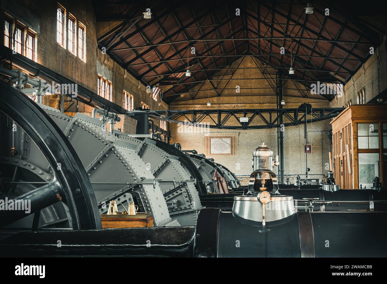 Lemmer, Netherlands - August 11, 2022: Machine hall with turbine in the world's largest steam pumping station in Lemmer, Netherlands. UNESCO World Her Stock Photo