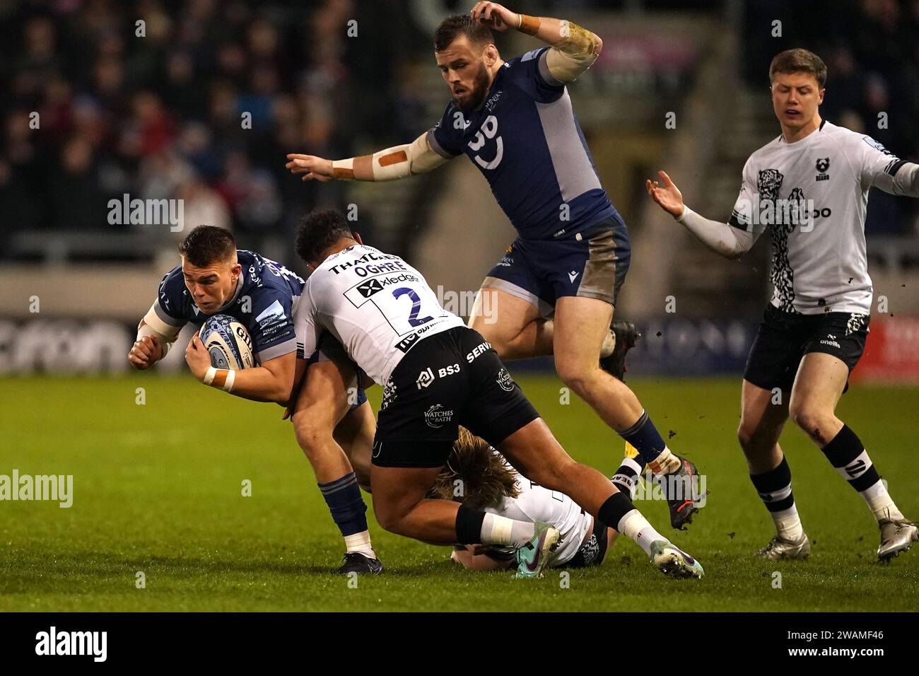 Sale Sharks' Joseph Carpenter (left) is tackled by Bristol Bears' Gabriel Oghre during the Gallagher Premiership match at the AJ Bell Stadium, Salford. Picture date: Friday January 5, 2024. Stock Photo
