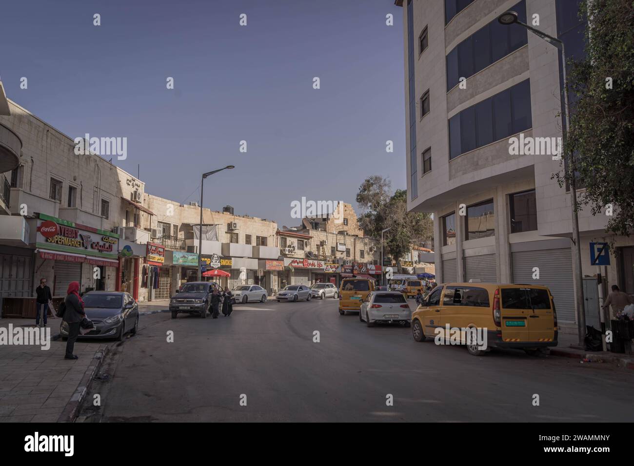 The cars and the buildings on the streets of Jericho downtown at West