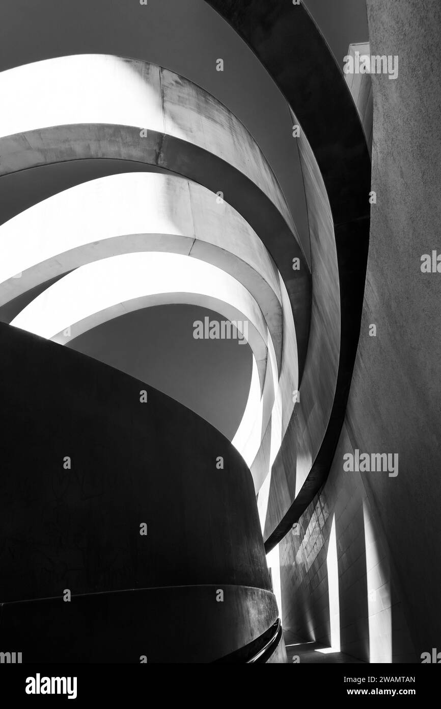 Striking monochrome architectural feature with sweeping curves and a