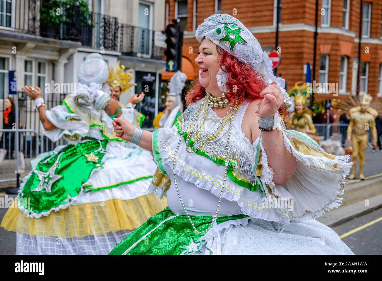 Members of the London School of Samba make their way to the start of