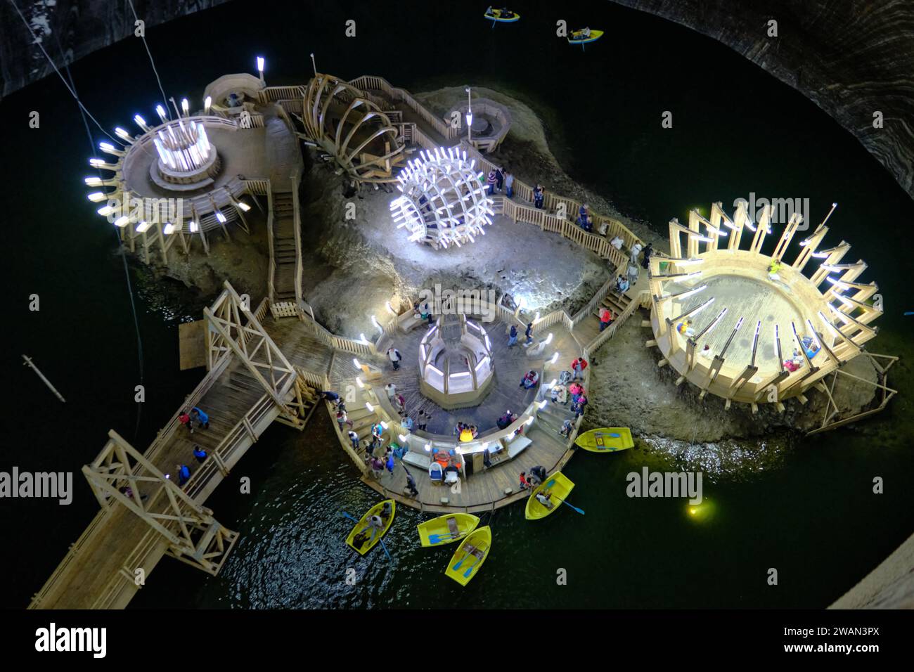 Salina Turda, the salt mine of Turda Romania, now disused and turned into a  a halotherapy center and a popular tourist attraction, with rides and an underground lake where visitors can rent boats to ride Stock Photo