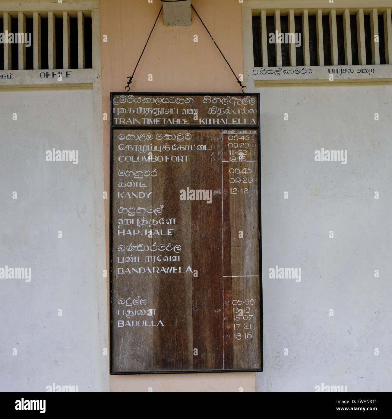 vintage looking train arrival and departure board in Sri Lanka train station Stock Photo