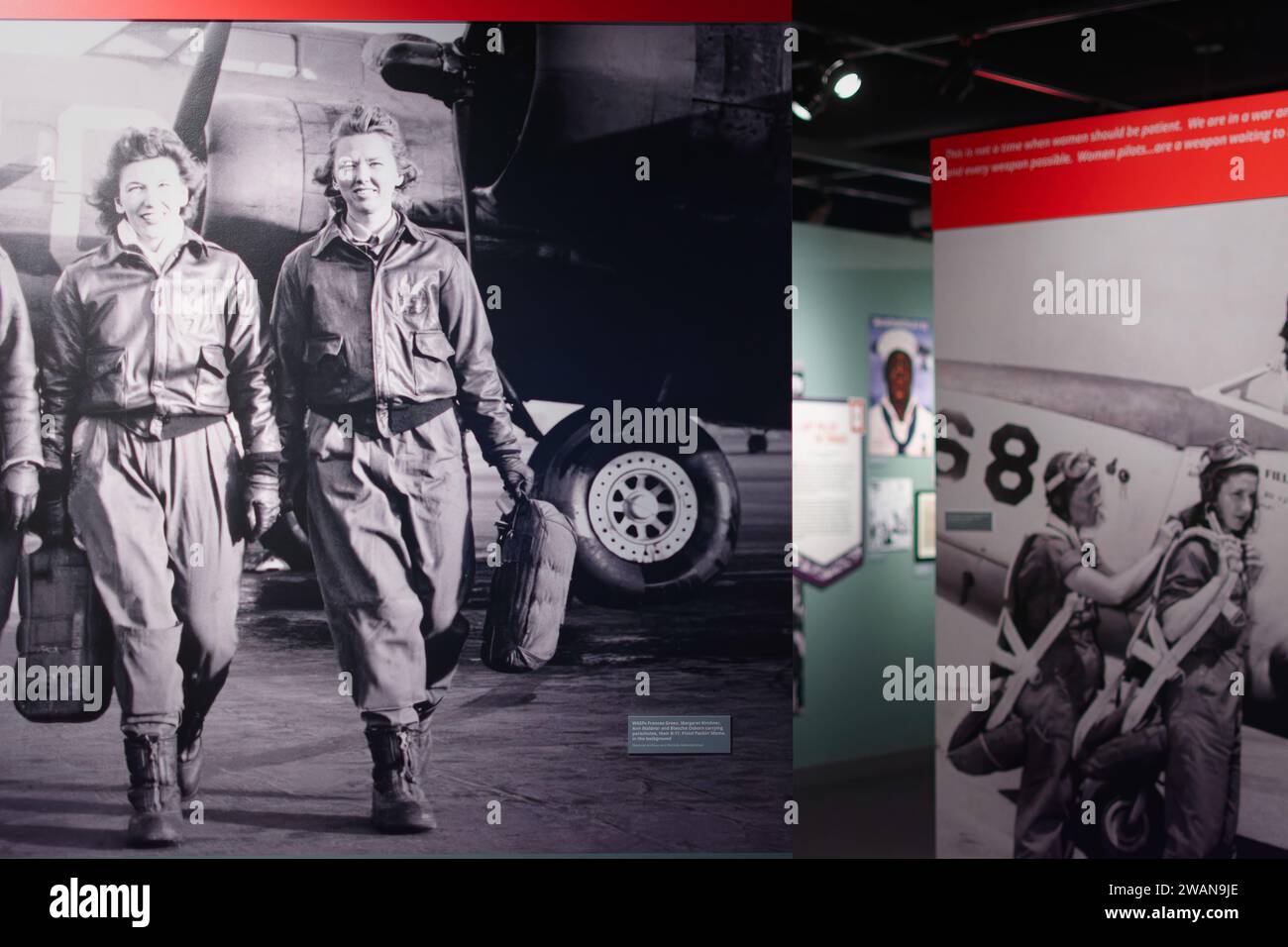 John F. Kennedy Presidential Library Boston, Massachusetts - WASP female pilots heading to the exiting their airplane on a runway in the WWII exhibit. Stock Photo