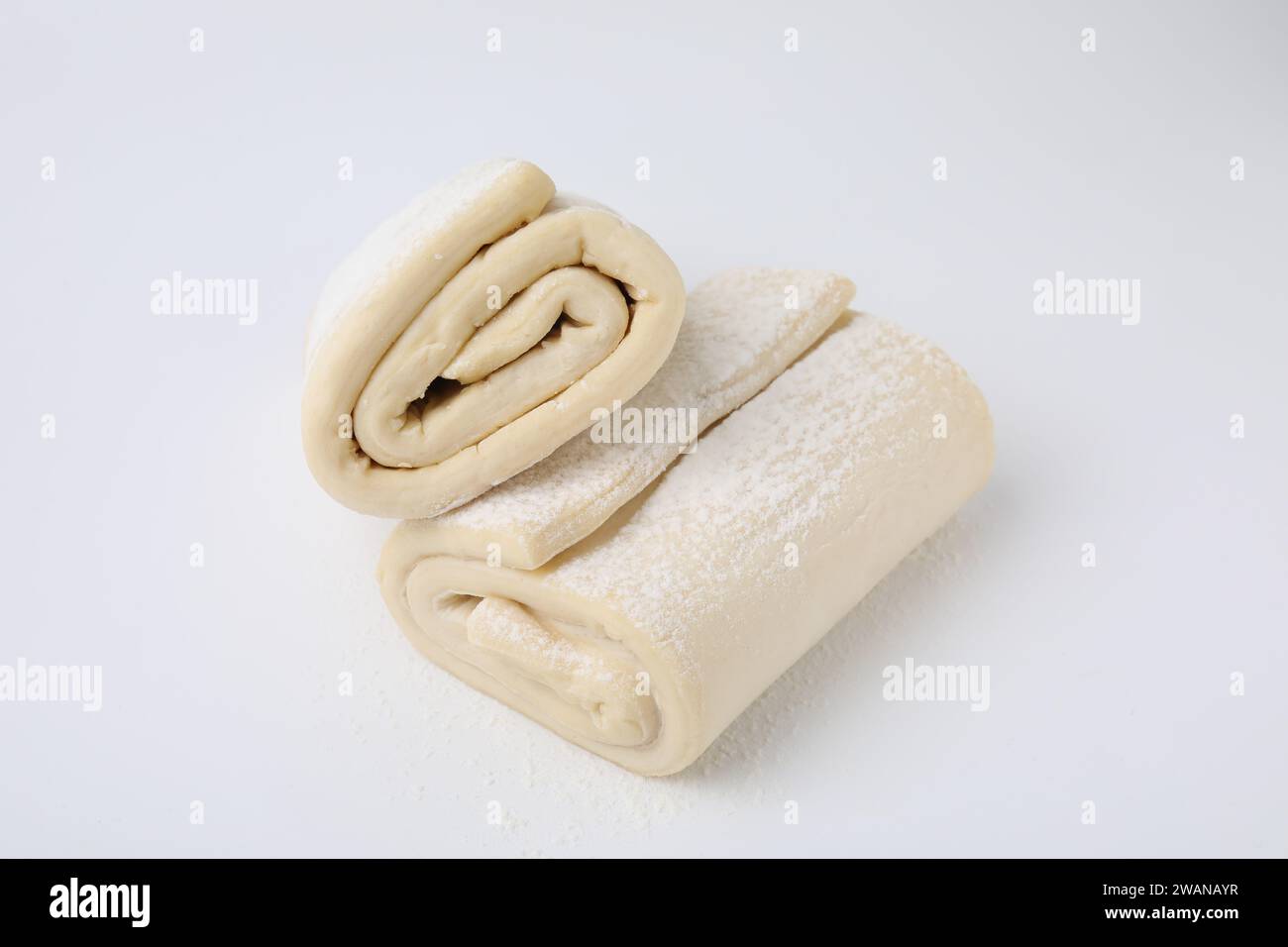 Raw puff pastry dough isolated on white Stock Photo - Alamy