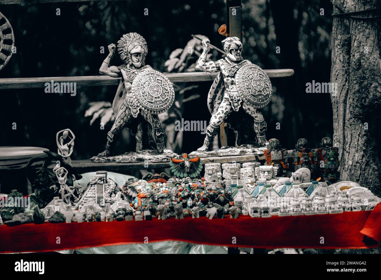 Market stalls selling wooden masks and other local souvenirs and ...