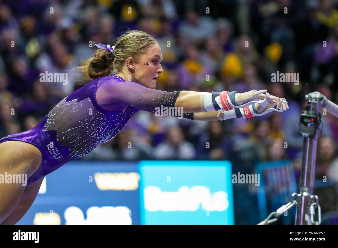 January 05, 2024: LSU's Savannah Schoenherr competes on the bars during NCAA Gymnastics action between the Ohio St. Buckeyes and the LSU Tigers at the Pete Maravich Assembly Center in Baton Rouge, LA. Jonathan Mailhes/CSM Stock Photo