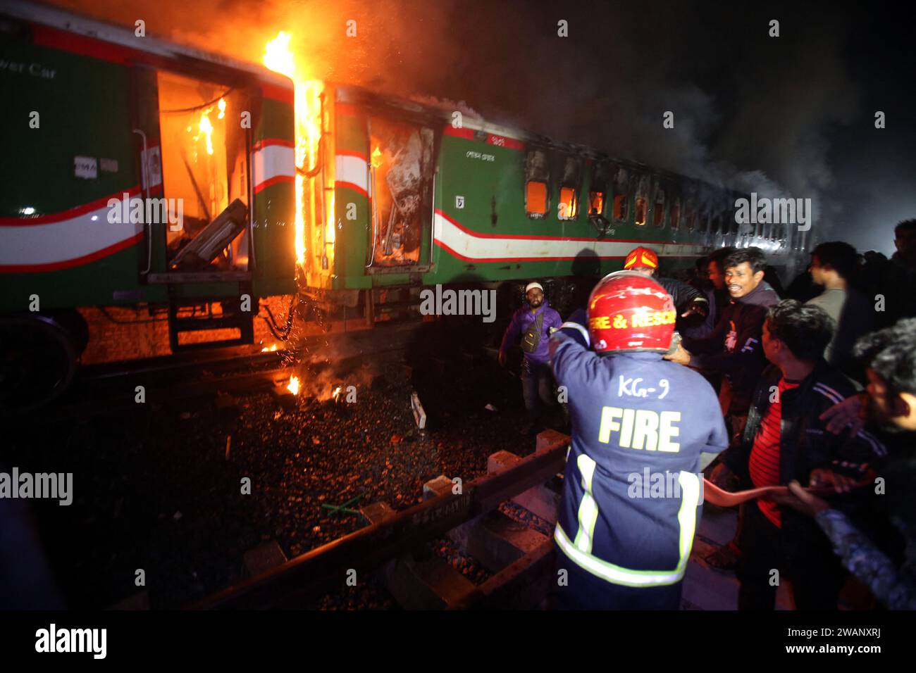 Dhaka Bangladesh 05th Jan 2024 Bangladeshi Rescue Personnel Search   Dhaka Bangladesh 05th Jan 2024 Bangladeshi Rescue Personnel Search Through A Burnt Out Carriage Of The Benapole Express In Dhaka On January 5 2024 Five People Were Killed In Bangladesh After A Passenger Train Which Was Arriving In The Capital Dhaka From The Western City Of Jessore Caught Fire On January 5 2024 With Police Suspecting An Arson Attack During Unrest Ahead Of National Elections Boycotted By The Opposition Photo By Rahman Habiburabacapresscom Credit Abaca Pressalamy Live News 2WANXRJ 