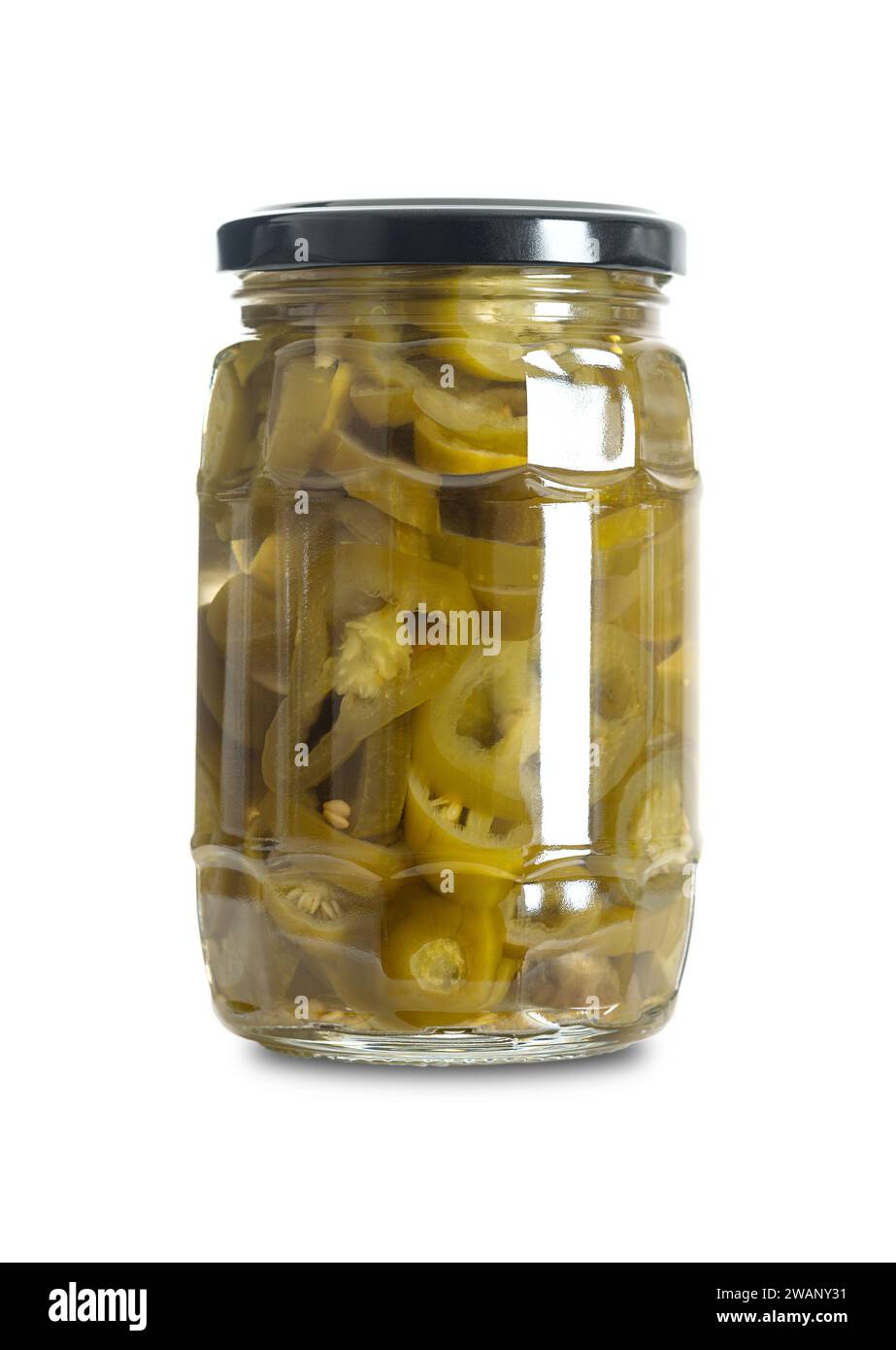 Jalapeno slices, pickled in a glass jar. Medium-sized hot, green chili peppers, cut into cross sections, pasteurized and preserved in a brine. Stock Photo