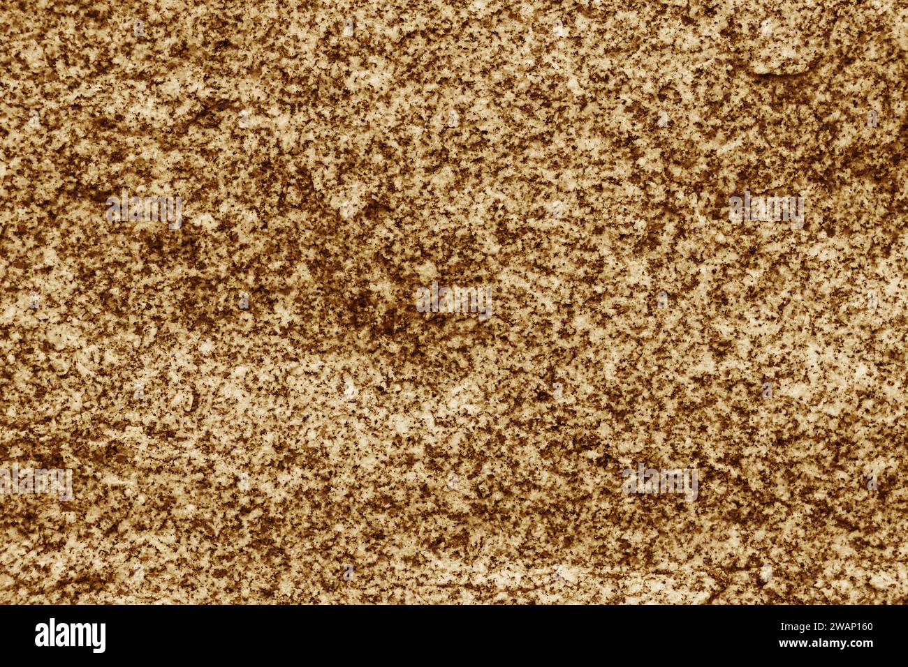 Yellow stone background. Toned stone texture. Embossed surface for design. Stock Photo