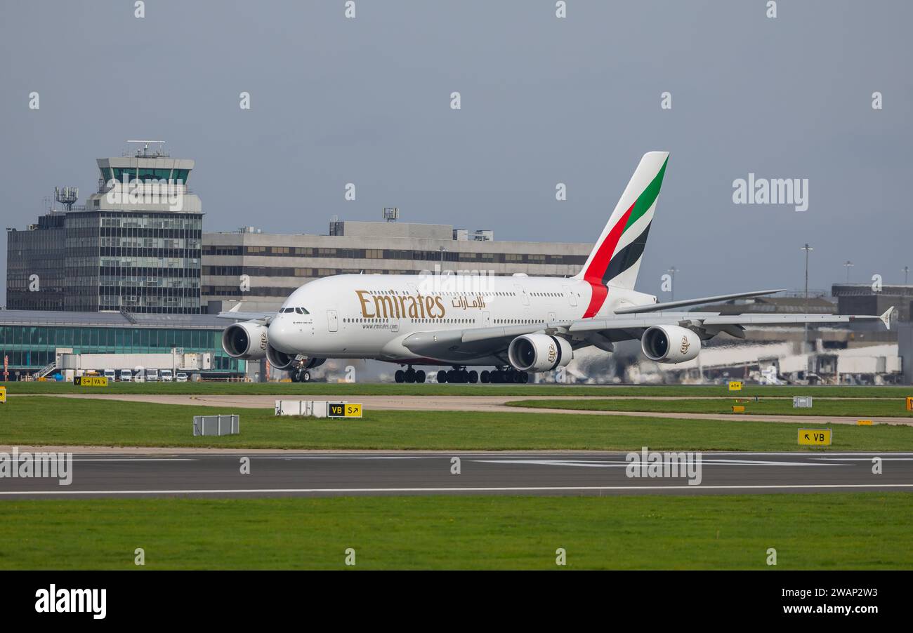 Emirates Airlines Airbus A380-800 aircraft, departing Manchester Airport in England Stock Photo